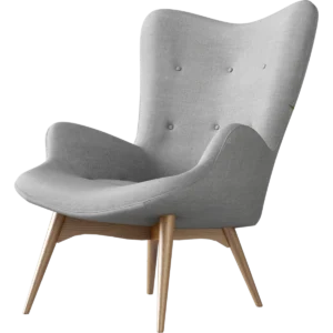 Deep-seated cozy armchair with plush gray velvet and thick cushioning in a modern living room.