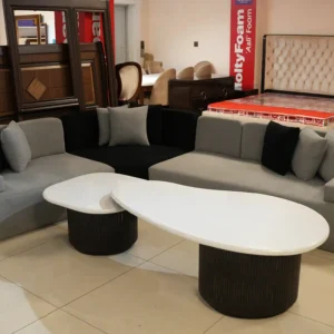 Modern deep-seated velvet sofa with solid wood frame and gold-leaf accents.